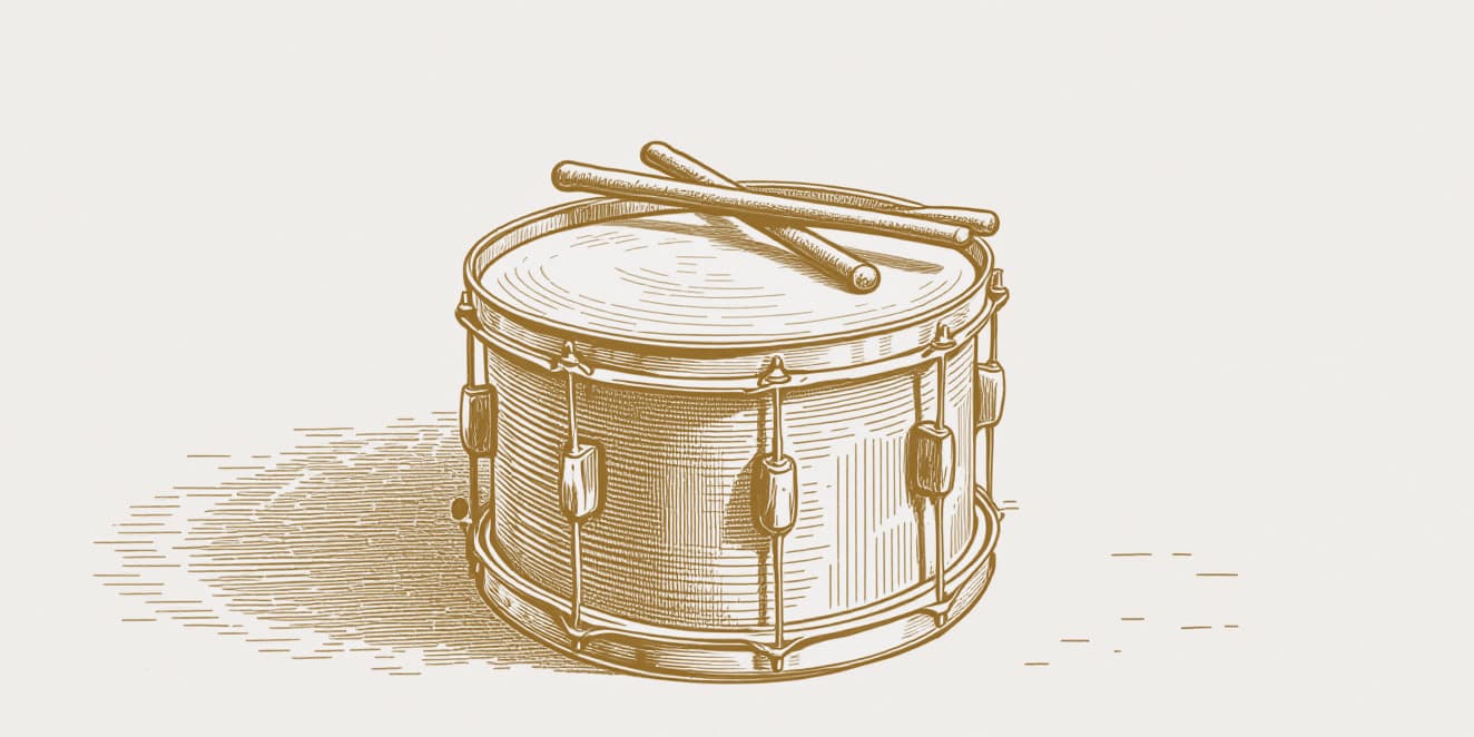 A drawing of a snare drum with two drumsticks crossed on its head, in gold line on pale paper.