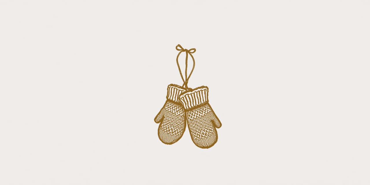 A drawing of a pair of patterned knitted mittens hanging together from a string, in gold line on pale paper.