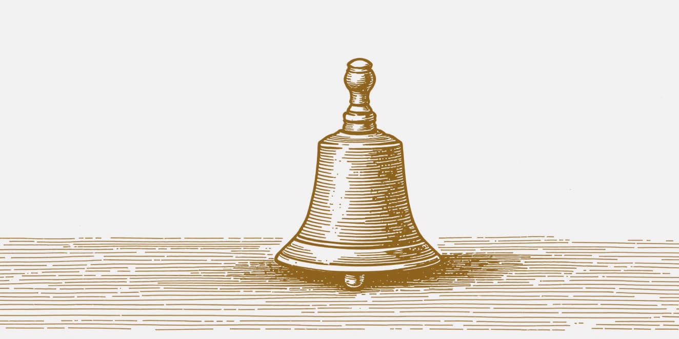 A drawing of a small handbell with a wooden handle, in gold line on pale paper.
